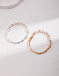 Vintage-gold sterling silver bracelet with natural pearls, small metal beads and an irregular fluid band.