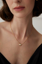 Framed Mother-of-Pearl Necklace