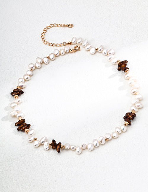 Vintage-gold sterling silver necklace with irregular natural pearls, polished beads and clusters of dark amber-brown Czech glass.